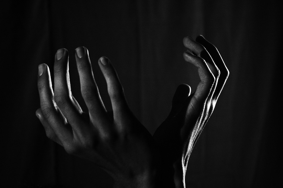 Hands in the dark